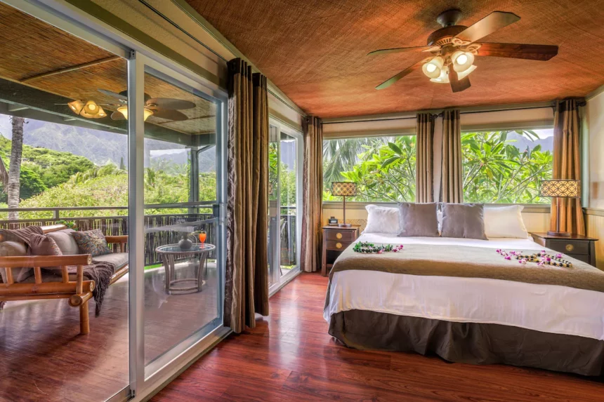 Cozy hotel room at Paradise Bay Resort with a balcony.